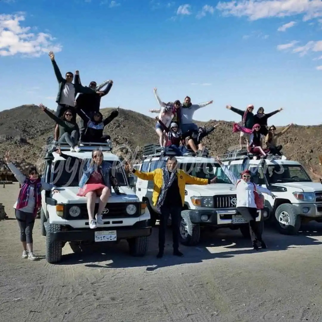 A 4x4WD Jeep driving across the rugged sand terrain during a Hurghada desert safari trip